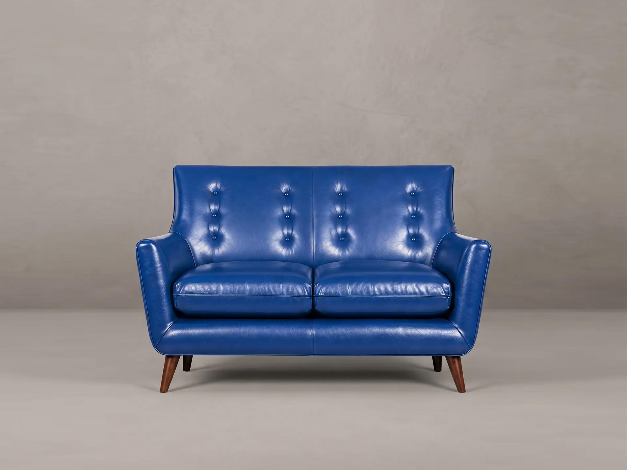 Gogo armchair in brown leather