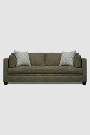 93 Greta sofa in Open Range Out Post green performance leather with pillows in Barkcloth Forest