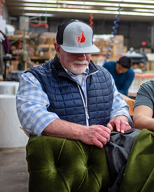 Roger Hazard working in factory